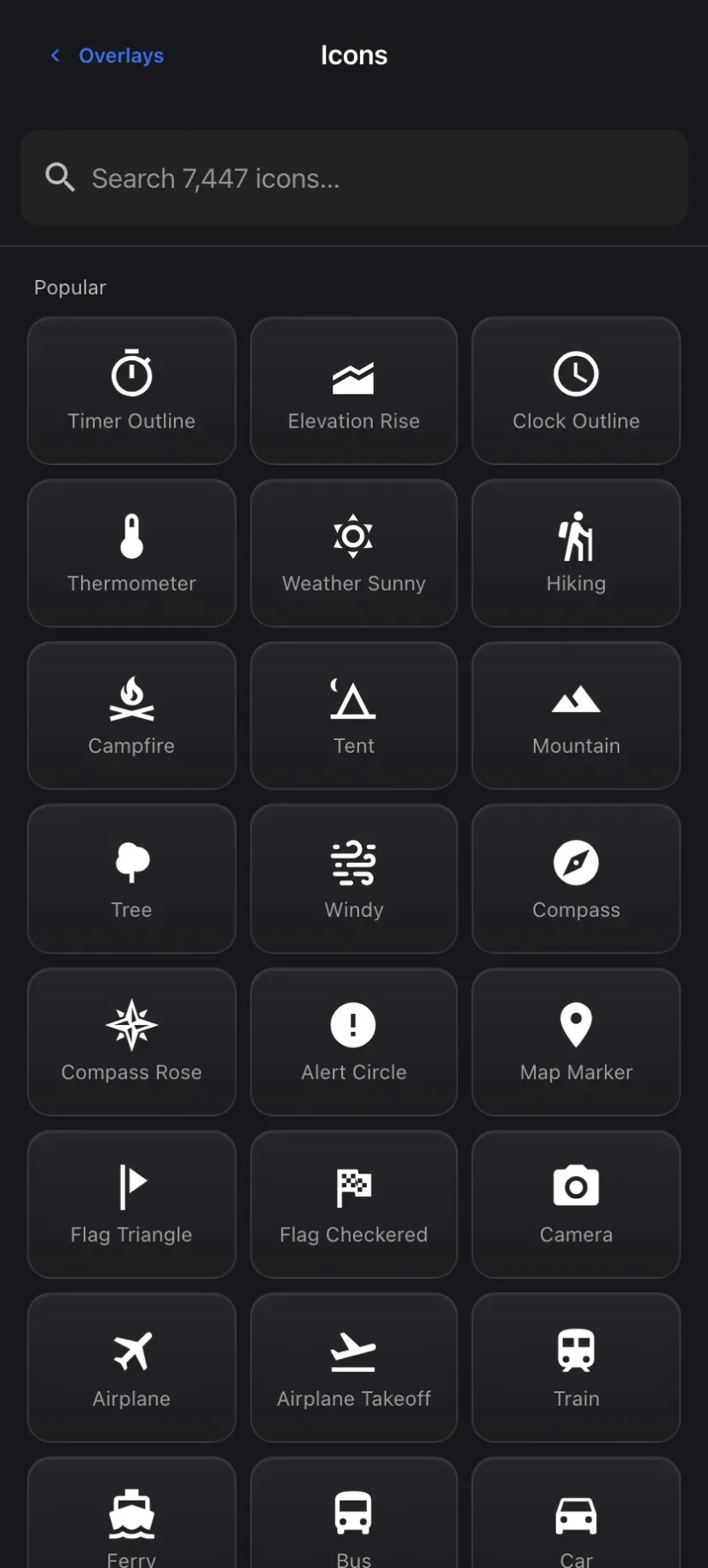 A selection of built-in symbol icons — timer, elevation, clock, thermometer, weather, hiking, campfire, tent, mountain, compass, flags, camera, and more
